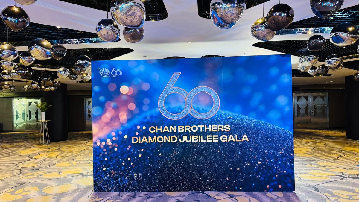 Chan Brothers Travel 60th Anniversary Dinner backdrop at Fairmont Ballroom